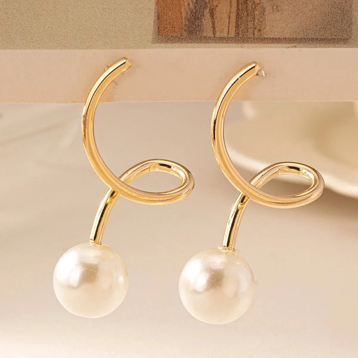 Curved Gold Arc Pearl Drop Earrings