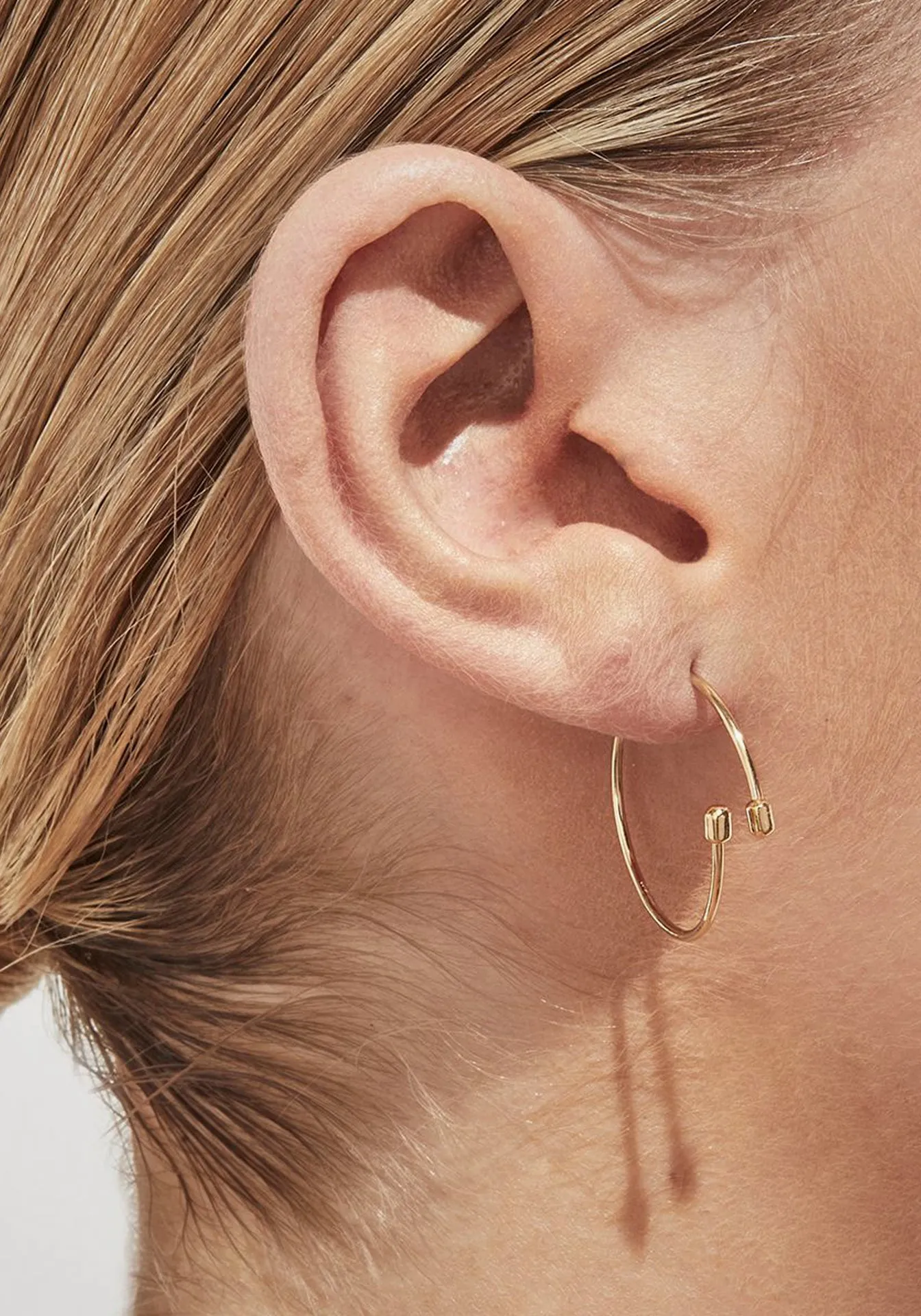 Twist 03, Yellow Gold Earring